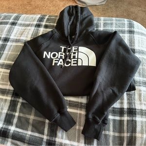 black north face logo hoodie size large (has hole in bottom)